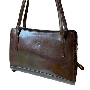 Monsac Brown Leather Handbag 10” wide 7” tall 3” actroos at bottom